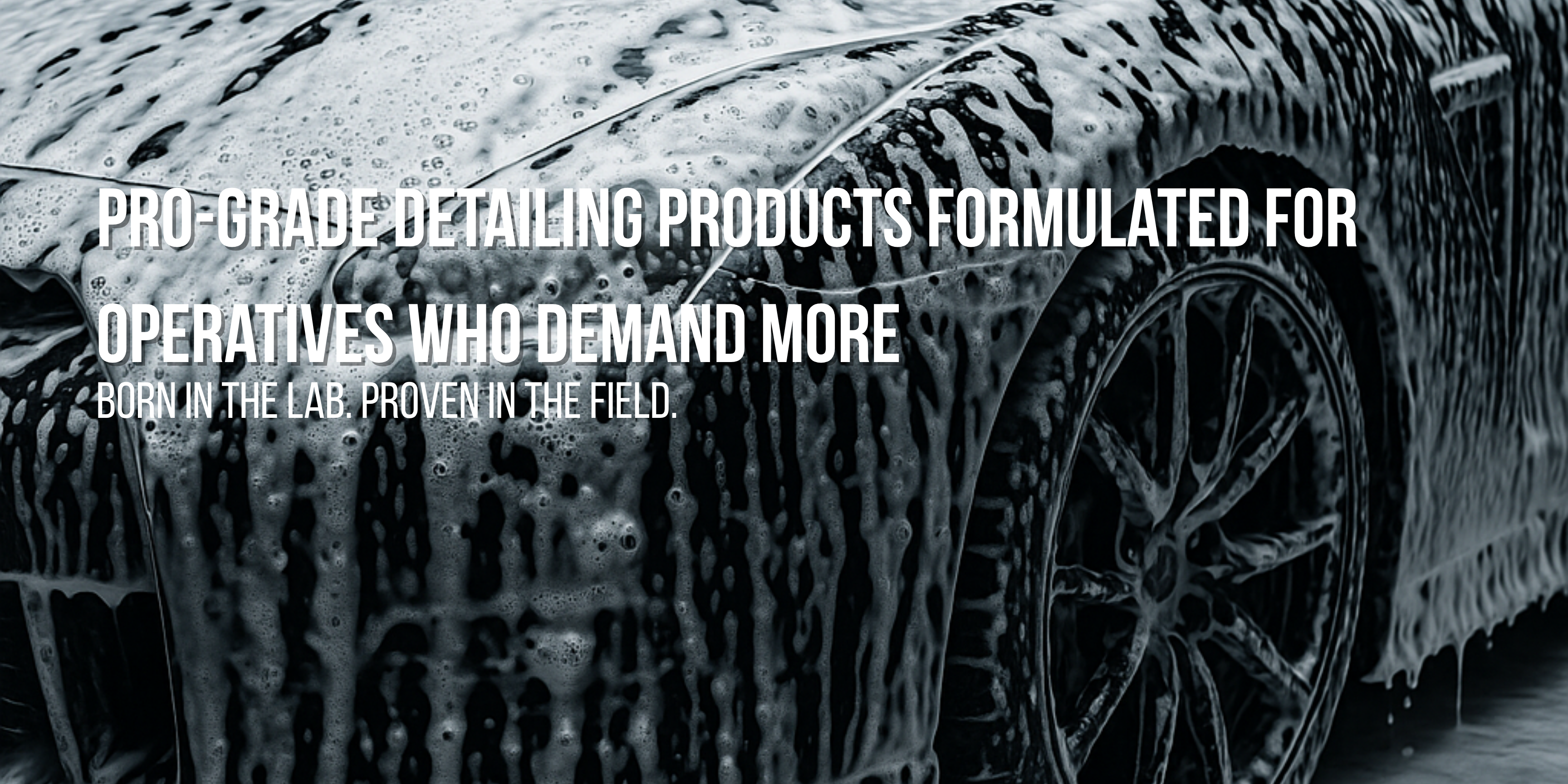 Car covered in soap suds with text about professional-grade detailing products.